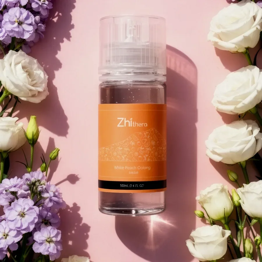 Zhithera Orange Blossom fragrance oil bottle on pink with lilac